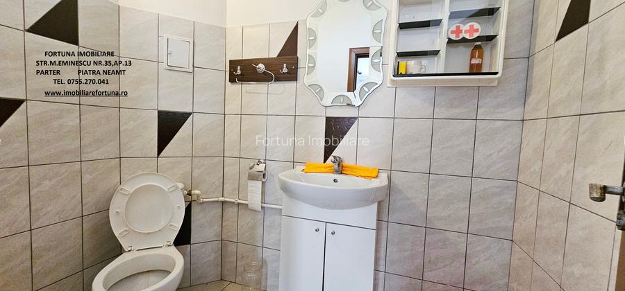 Locuinta individuala(apartament 4 camere)+spatiu comercial si teren ,Darmanesti - 21