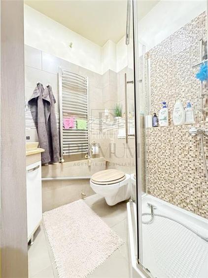 BUZIASULUI - 3 CAM - CENTRALA/AC - BLOC ANVELOPAT - 2 BAI - ETAJ 1 - 10