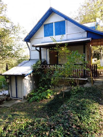 TEREN INTRAVILAN CABANA SI DEPOZIT DE UNELTE - 5