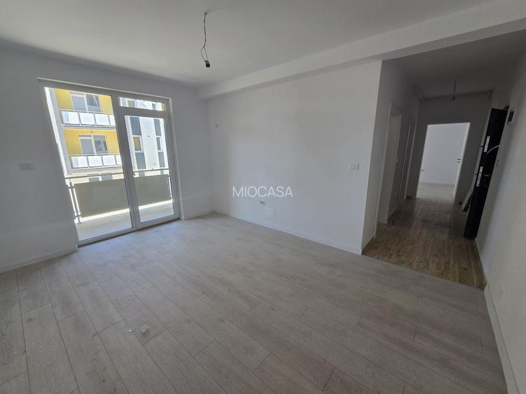 Model spatios - 55 mp. Decomandat. Bucatarie inchisa. - 4