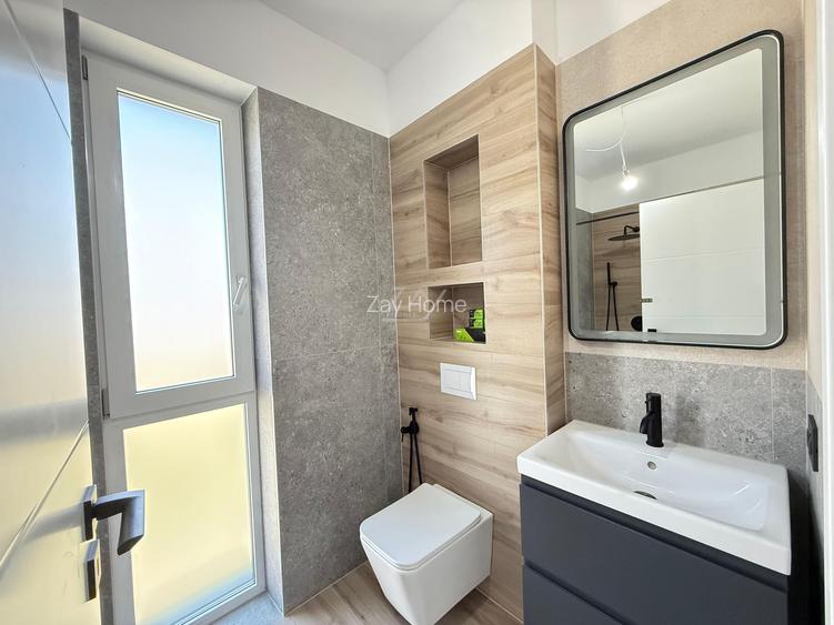 Ap pe 2 niveluri. 3 camere, 2 bai. 2 locuri de parcare. - 3