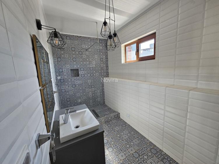 Casă spațioasă de închiriat cu curte amenajată și facilități complete - 46