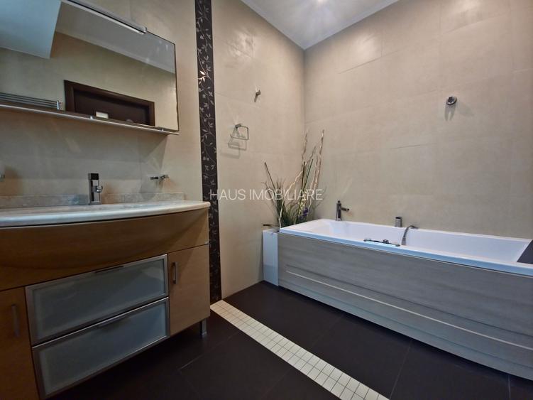 Apartament 3 camere 2 bai lux parcare subterana termen lung zona KM 5 - 22