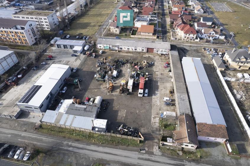 Teren intravilan 6.555 mp cu hală industrială - 2