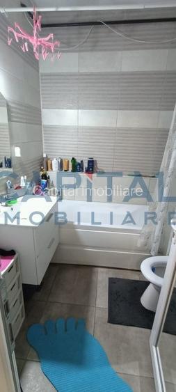 Constructie cu 3 apartamente + teren+ 2 spatii comerciale - 6