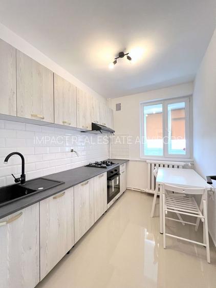 2 camere renovat complet vedere spate Bd. Dinicu Golescu-Gara de Nord - 4