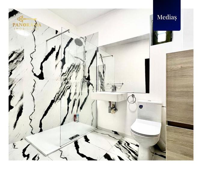 Apartament de 70 mp la parter, situat în zona centrală - 9