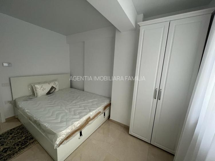 Inchiriem studio in Micro 17 , etaj 2 bloc ROKA, parcare privata, - 3