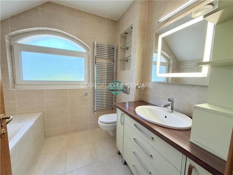 Vand casa in Sancrai cu 5 camere, 2 bai avand un teren generos de 1000mp - 10