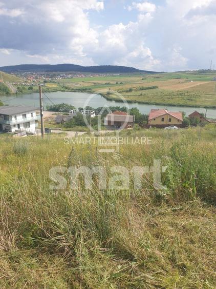 Teren pentru constructie , Chinteni, zona Lacurilor, front la 2 strazi - 3