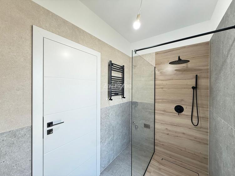 Ap pe 2 niveluri. 3 camere, 2 bai. 2 locuri de parcare. - 5