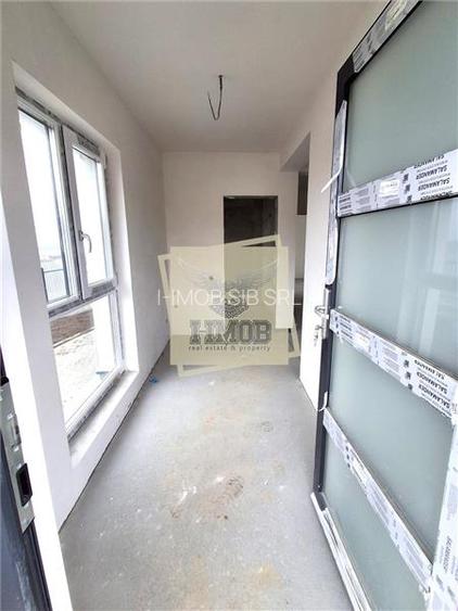 Casa cu 4 camere 2 bai si 300 mp teren in zona Calea Cisnadiei - 14