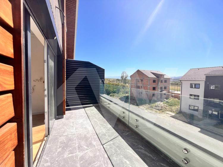 Apart. cu 2 cam. pe două nivele, cu logie. Vilă design modern în Cristian-Sibiu - 15