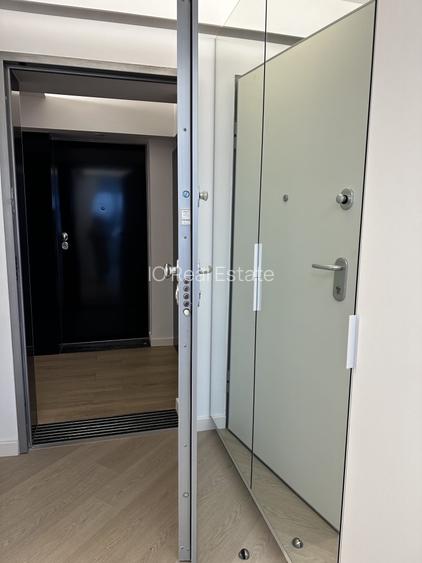 INCHIRIERE APARTAMENT MODERN 3 CAMERE/CORTINA NORTH/ LOC PARCARE SUBTERAN - 24