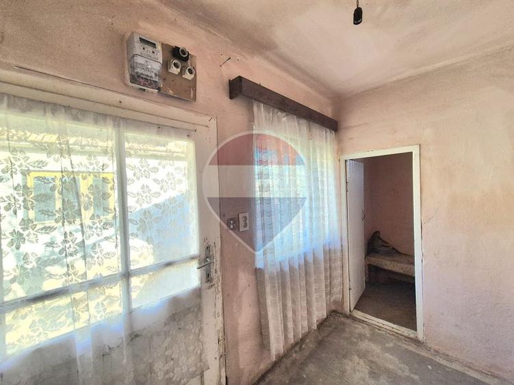 Proprietate cu teren 1.359 mp, poziție pe colț și utilități la strada