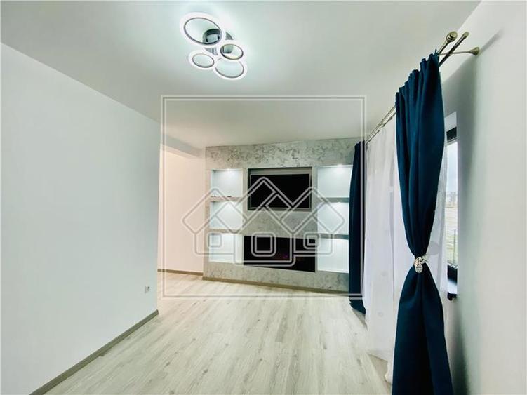 Ap. 2 camere si gradina, mobilat si utilat modern, zona D. Stanca