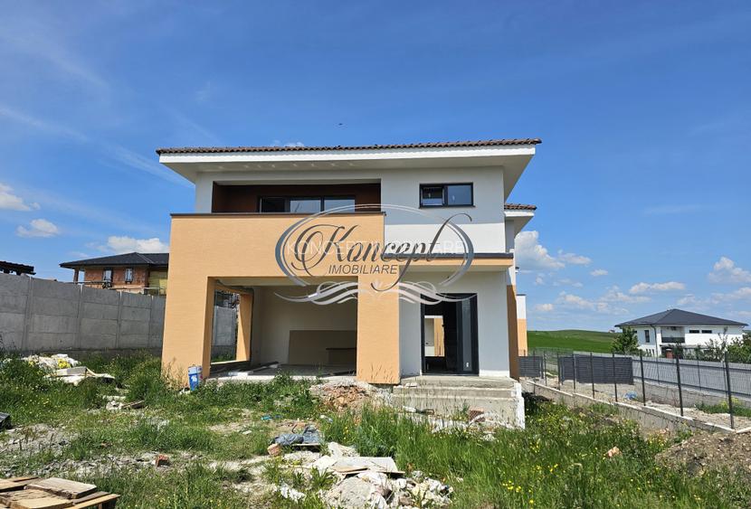 Casa individuala cu garaj si terase generoase in Chinteni - 4