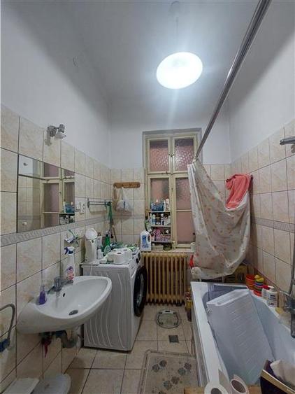 Apartament ultracentral cu curte privata