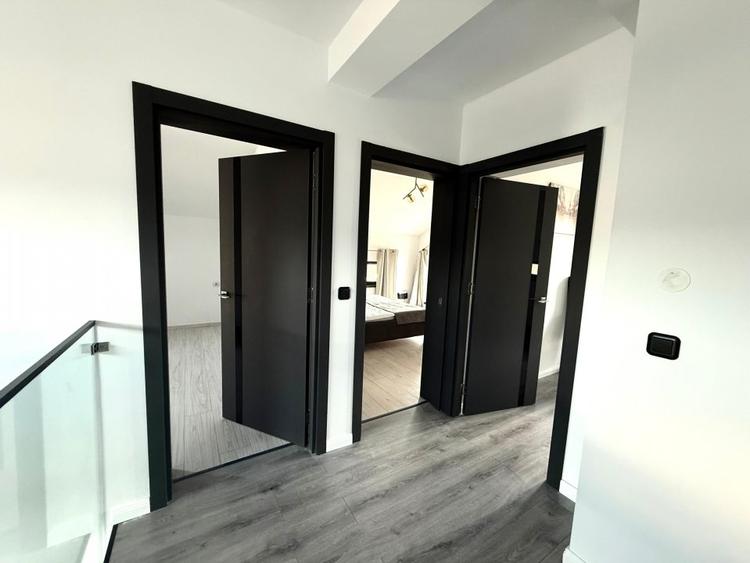 Vilă de vânzare cu design deosebit în cartierul Bucium
