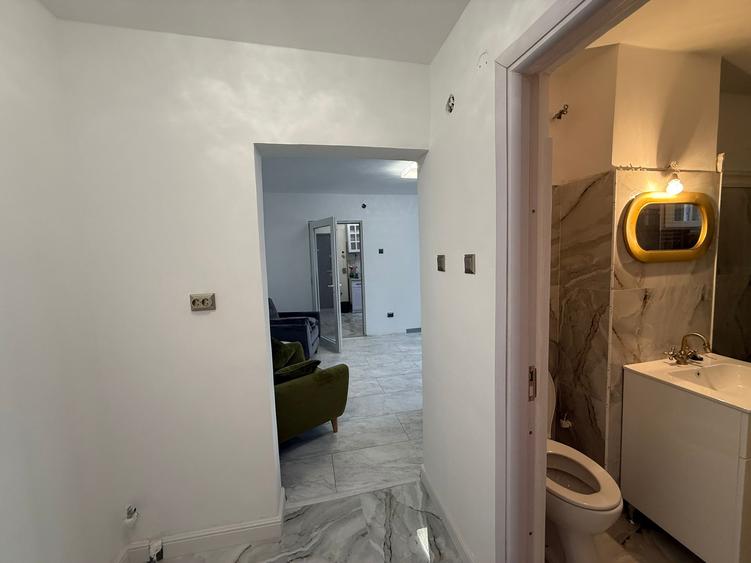 Apartament 2 camere,parter,zona Piata Centrala