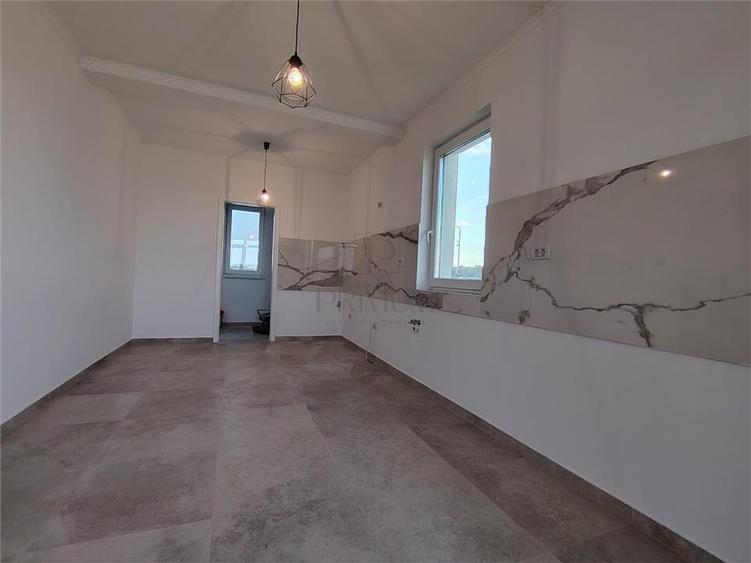 Casa individuala - finalizata - living mare - bucatarie separata