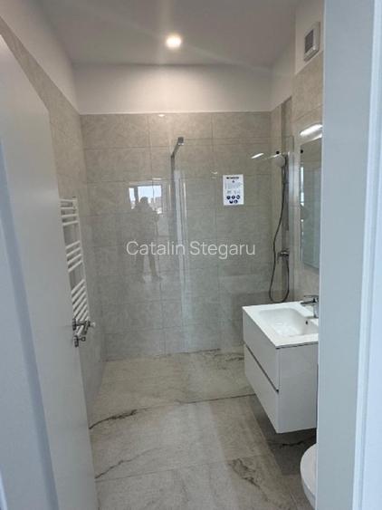 Garsoniera 36,4 mp + terasa 16,82 mp , Balotesti , Sos.Unirii 17 - 5