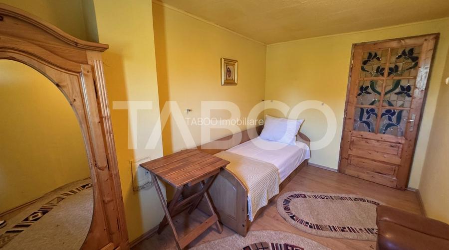 Casa de vanzare 6 camere loc de relaxare garaj teren 669 mp Cornatel - 14