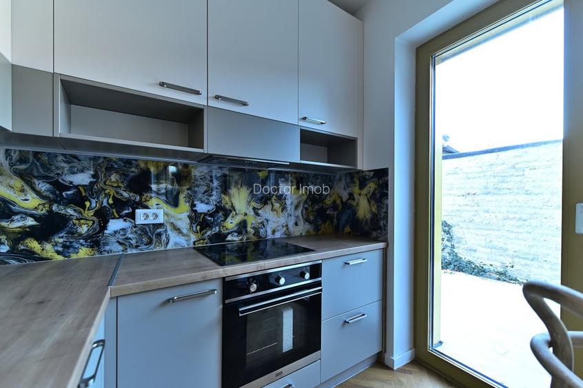 Rafinament, liniște și spațiu exterior privat în centrul Bucureștiului - 11