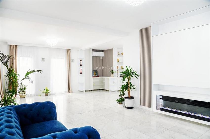 Casa intr-o zona linistita cu garaj si teren-1091 mp - 2