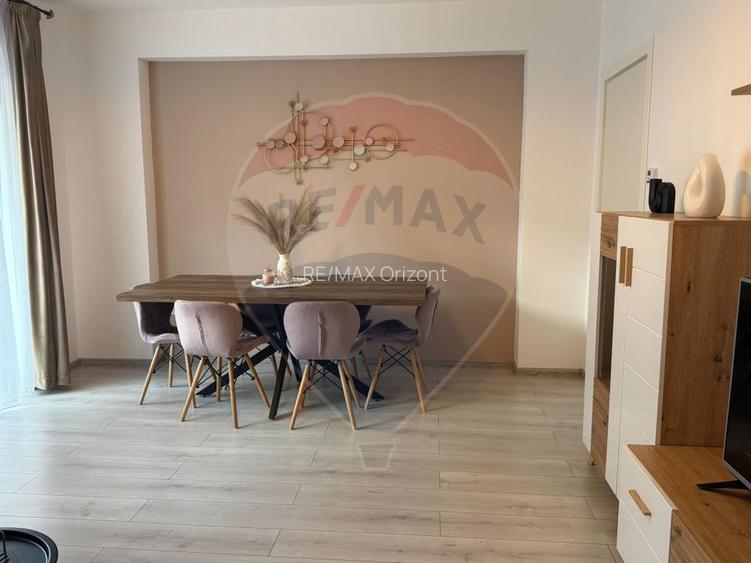 Apartament cu 3 camere, 2 bai și loc de parcare - 50