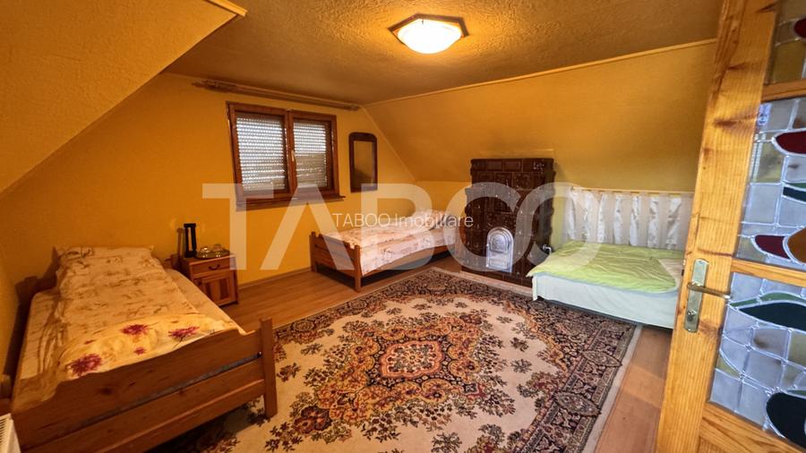 Casa de vanzare 6 camere loc de relaxare garaj teren 669 mp Cornatel - 10