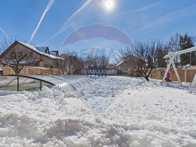 Vilă cu 6 camere, piscina si teren 1300 mp, de vânzare în Otopeni - 39