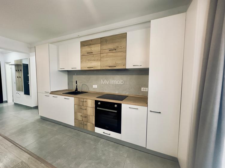 Apartament  cu 2 camere de inchiriat in zona Tractorul Coresi cu dressing,parter - 5