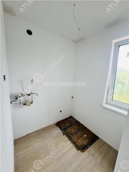 Casa individuala in Cisnadioara cu 4 camere 2 bai terasa teren 1170 mp - 21