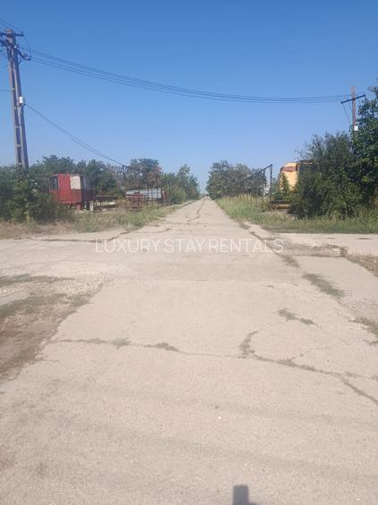 TEREN DE VÂNZARE – CREVEDIA, 96000 MP – cu trei intrari din DN1A - 2