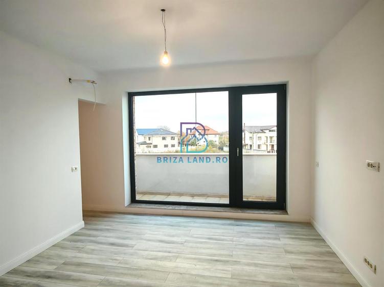 Mogosoaia, zona Livezilor, casa P+2E, 4 camere, 4 bai, teren 350mp - 16