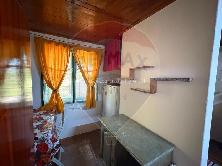 Teren intravilan 589 mp si cabana din caramida in Cuvin - 4