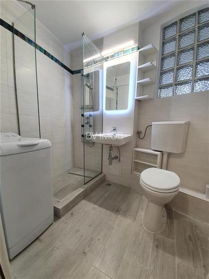 Inchiriere Garsoniera in bloc de apartamente, zona Astra, moderna - 13