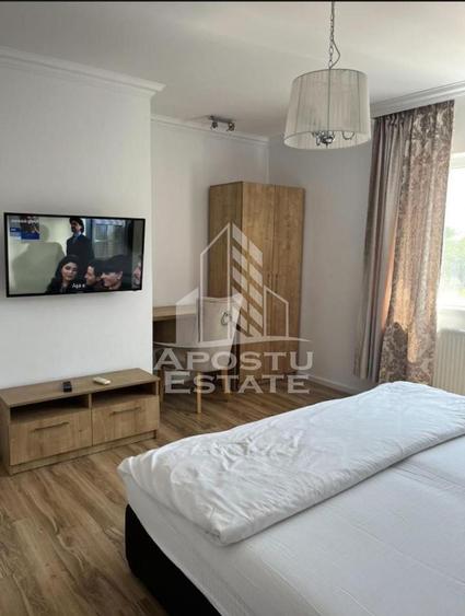 Cladire cu 4 apartamente si sala de evenimente ptr 60 persoane