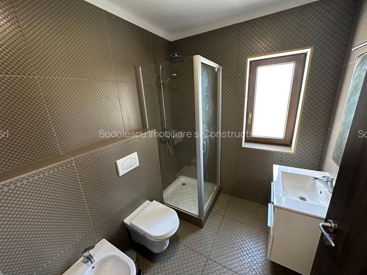 CASA SPATIOASA  CU GARAJ SI TEREN DE 600 MP - 6