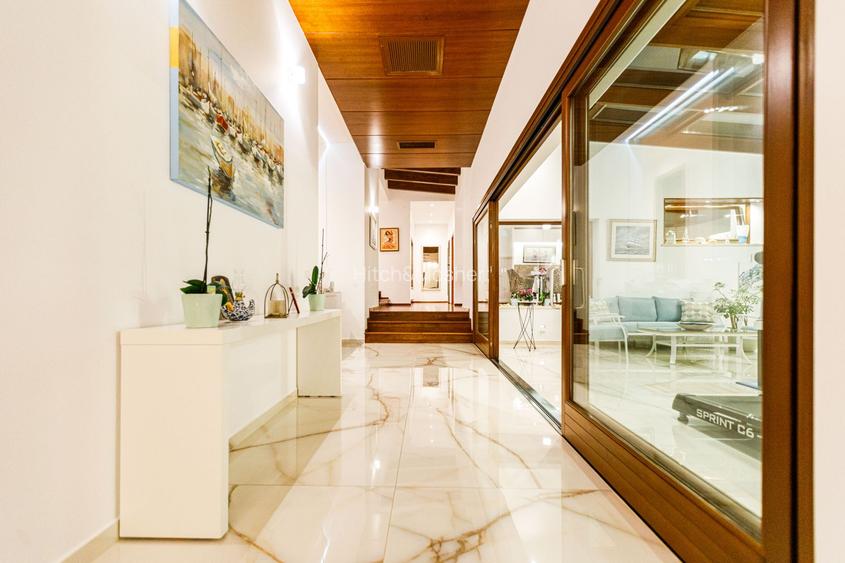 Arhitectura Distinsa: Casa Moderna Plan Parter si Piscina Privata - 10