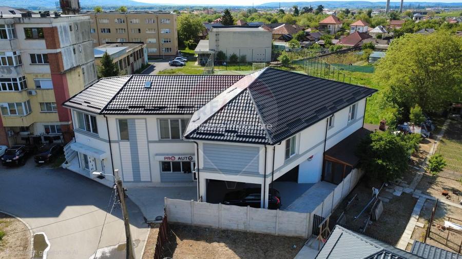 Proprietate premium în Filiași, locuință de lux cu spații comerciale - 44