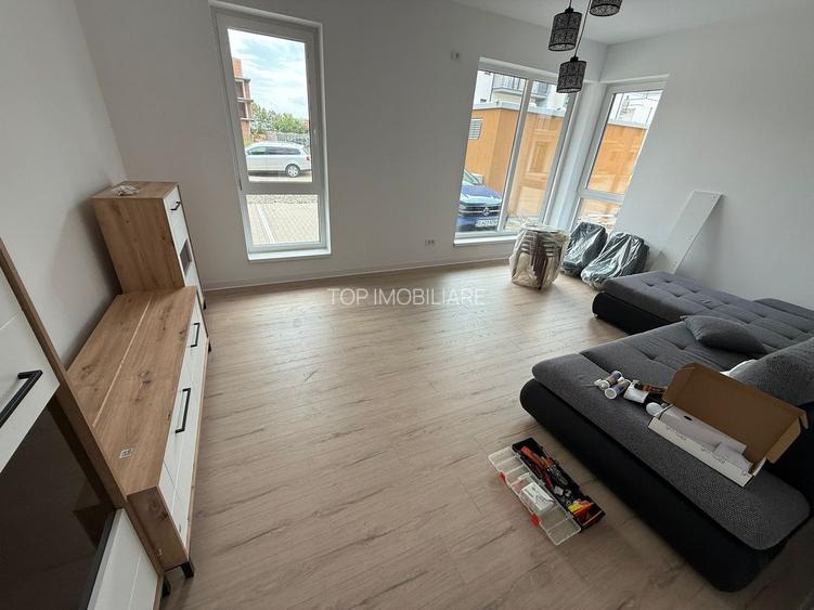 APARTAMENT DECOMANDAT CU TERASA DE 18 MP SI GRADINA  - - 8