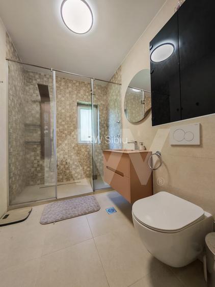 Modern și decomandat: 3 camere, 2 băi și curte de 86mp. Programează o vizionare! - 9