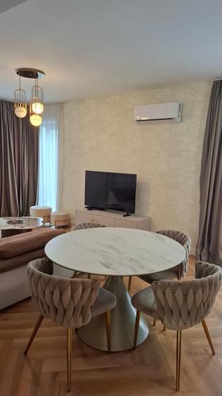 Apartament 2 camere complet mobilat si utilat in bloc boutique