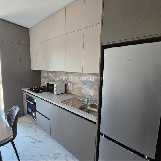 Prima inchieriere - apartament decomandat + loc de parcare subteran - 4