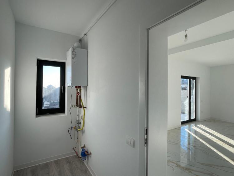Duplex despartit prin camera tehnica finisaje premium Mosnita