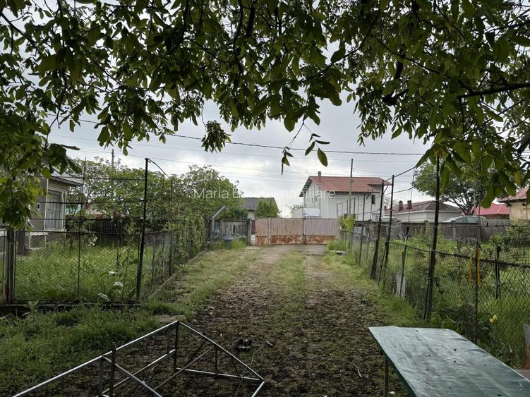 Teren intravilan  3447 mp, cu casa modesta, Desch. 30 m, str. Gr. Alexandrescu - 11