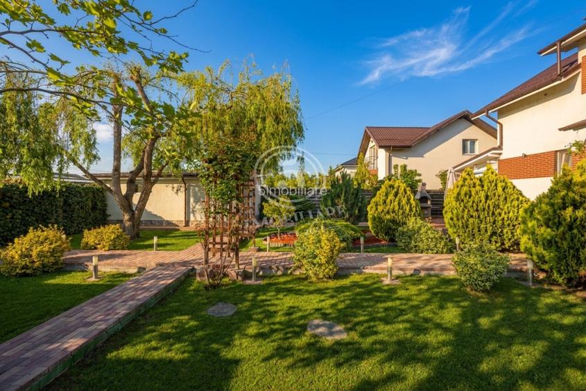 Casa cu probabil cea mai frumoasă grădină din Bragadiru + 2 garaje - 33