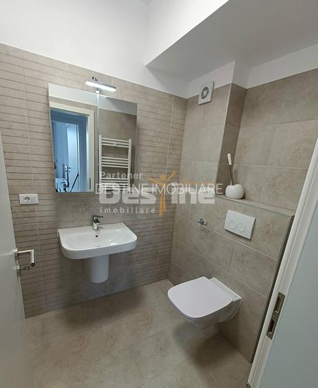 Apartament cu 3 camere, balcon 20 mp, loc de parcare acoperit, 2 bai, Tractorul - 6